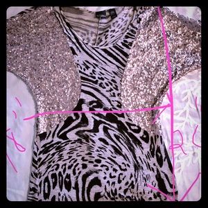 Daytrip sequin zebra print woman’s top.